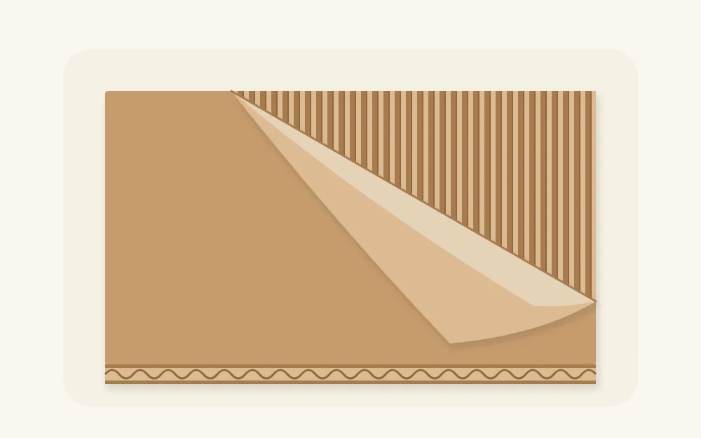 Cardboard piece with its top paper layer partly peeled back to show the ribbed layer