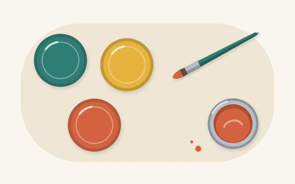 Three jar lids seen from above painted in three different colors, next to a brush and a paint pot